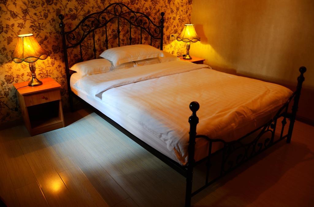 Snail Youth Hostel Huzhou Quarto foto